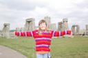 Got the whole henge in her hands